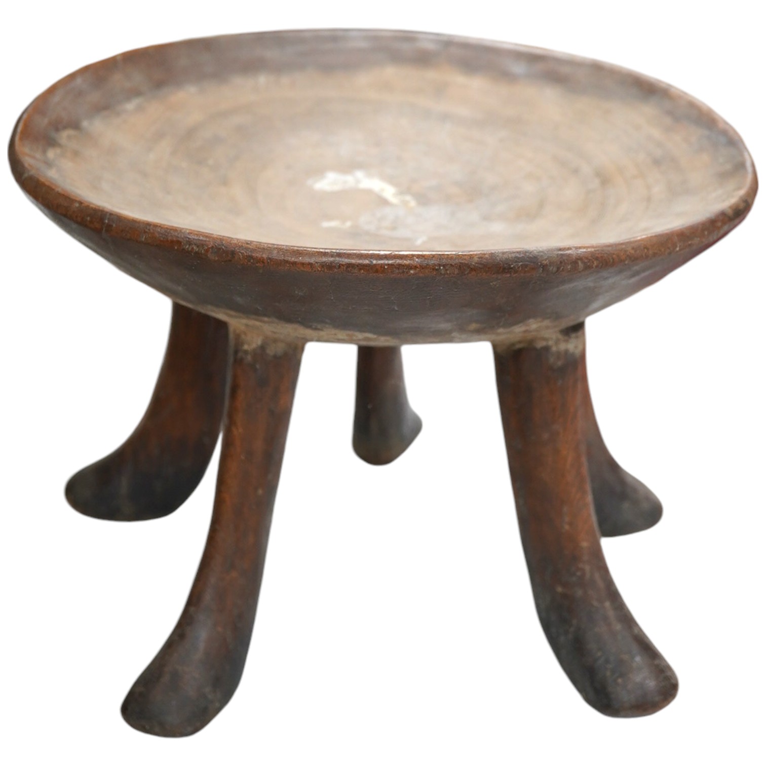 An African five-legged wooden bowl, 21cm high. Condition - fair